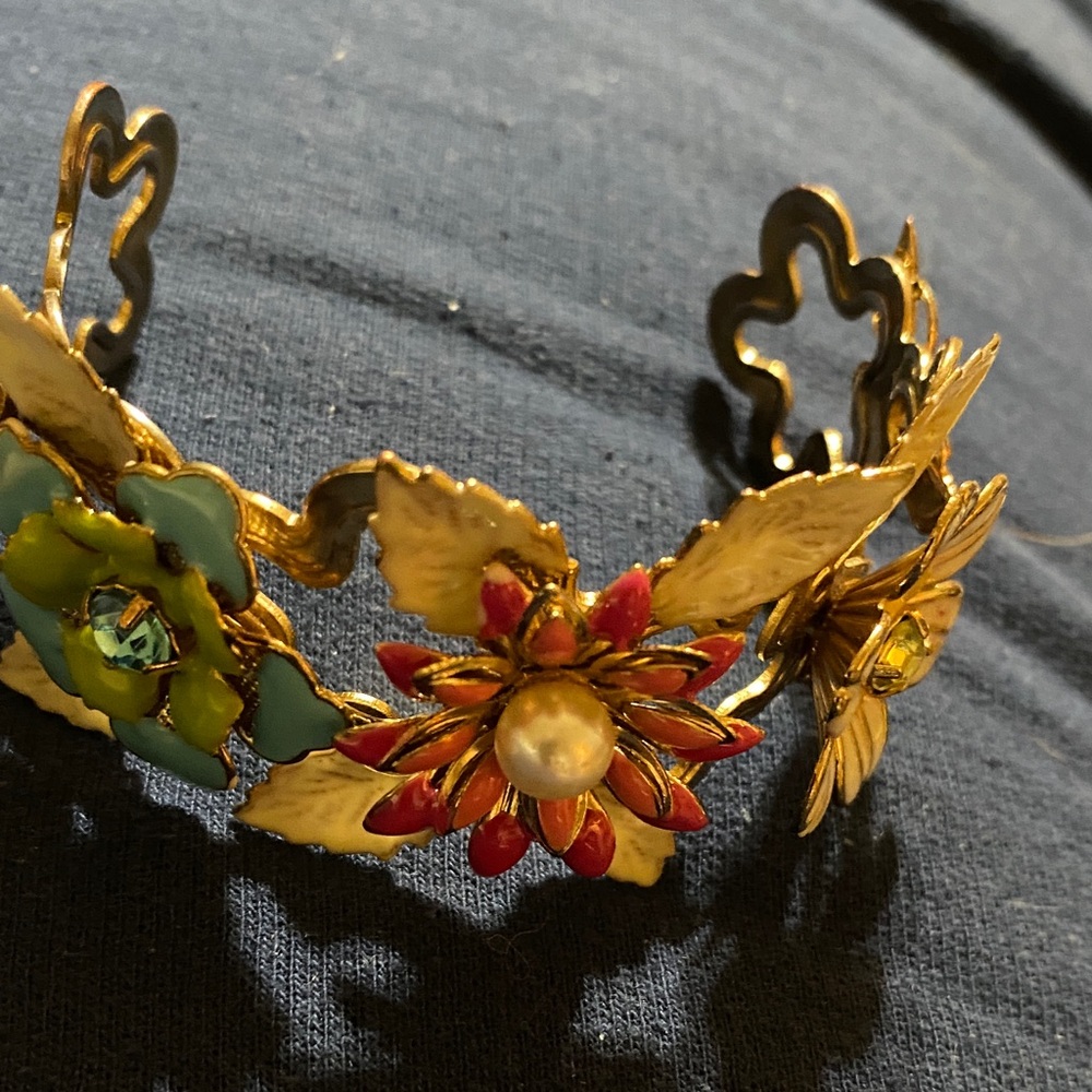 Vintage enamel painted flowers and butterfly cuff bracelet 
  5 1/2” expandable